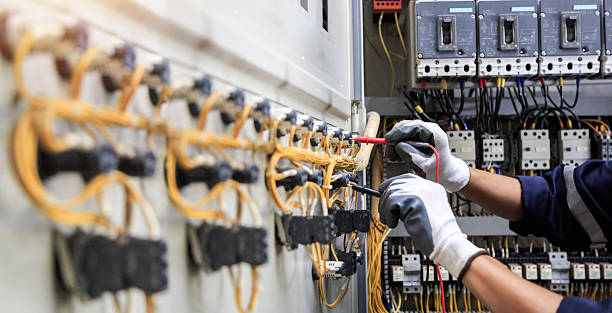 Professional Electrician technician working in Stockbridge, GA